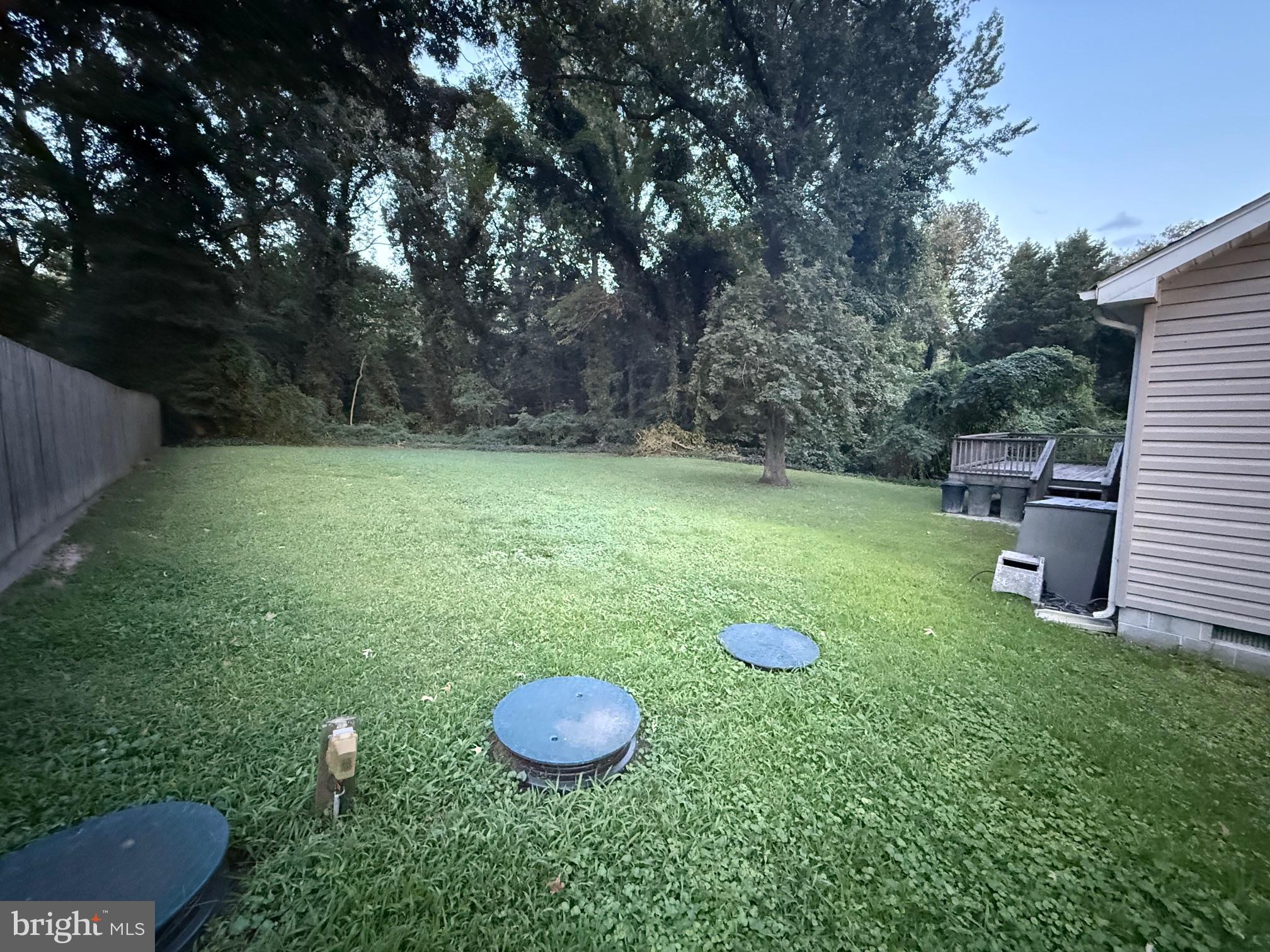 6209 Rockawalkin Road Salisbury, MD 21801 - Photo 20 of 37 a view of a backyard with a slide