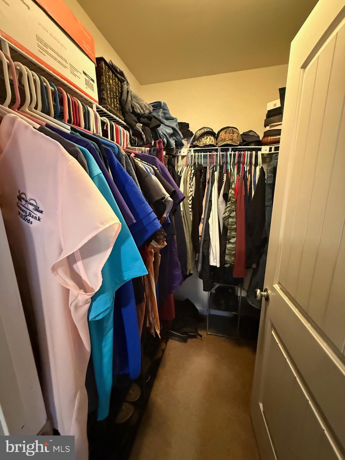 6209 Rockawalkin Road Salisbury, MD 21801 - Photo 30 of 37 a view of walk in closet with clothes and shoes