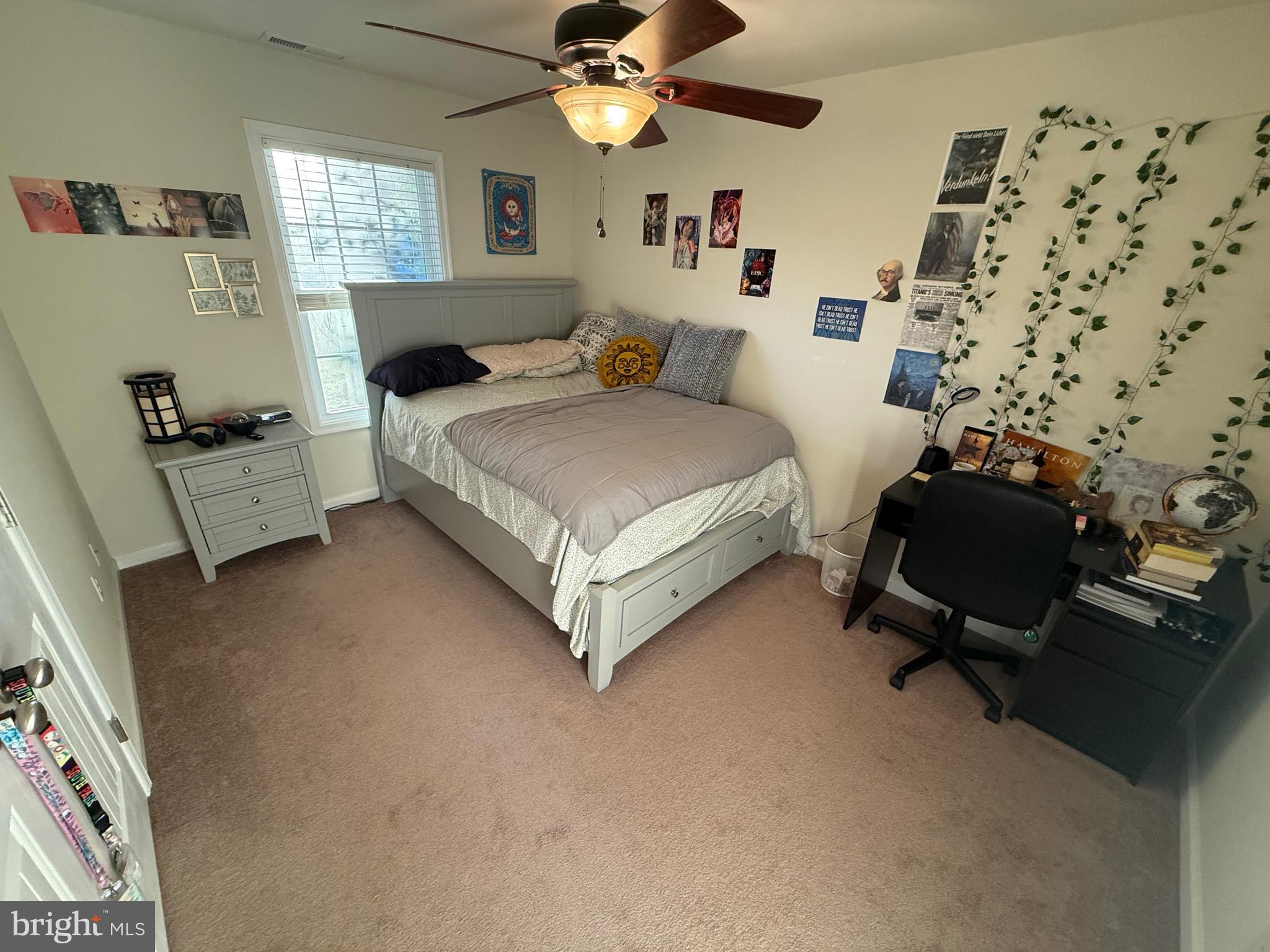 6209 Rockawalkin Road Salisbury, MD 21801 - Photo 33 of 37 a bedroom with furniture and a window
