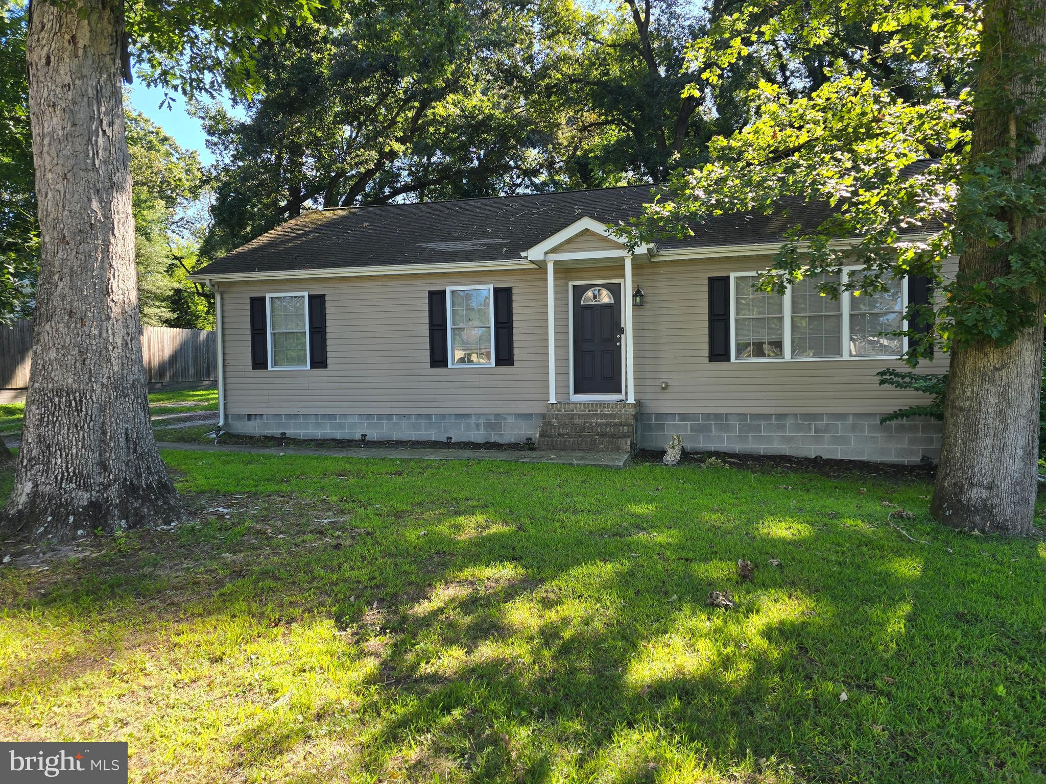 6209 Rockawalkin Road Salisbury, MD 21801 - Photo 10 of 37 a front view of house with yard and green space