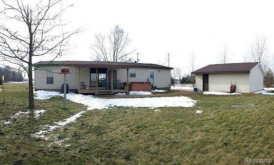 10215 West Lovejoy Road Byron, MI 48418 - Photo 6 of 11 Exterior back of home