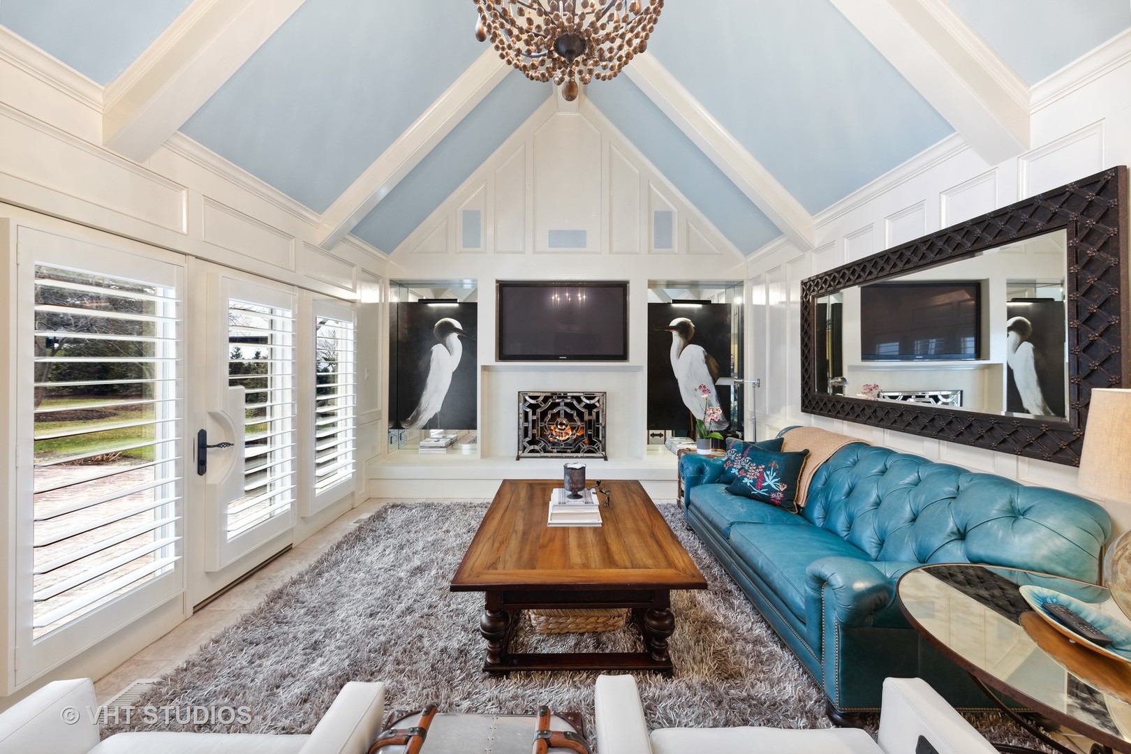 104 Burr Ridge Club Burr Ridge, IL 60527 - Photo 12 of 32 a living room with furniture and a flat screen tv