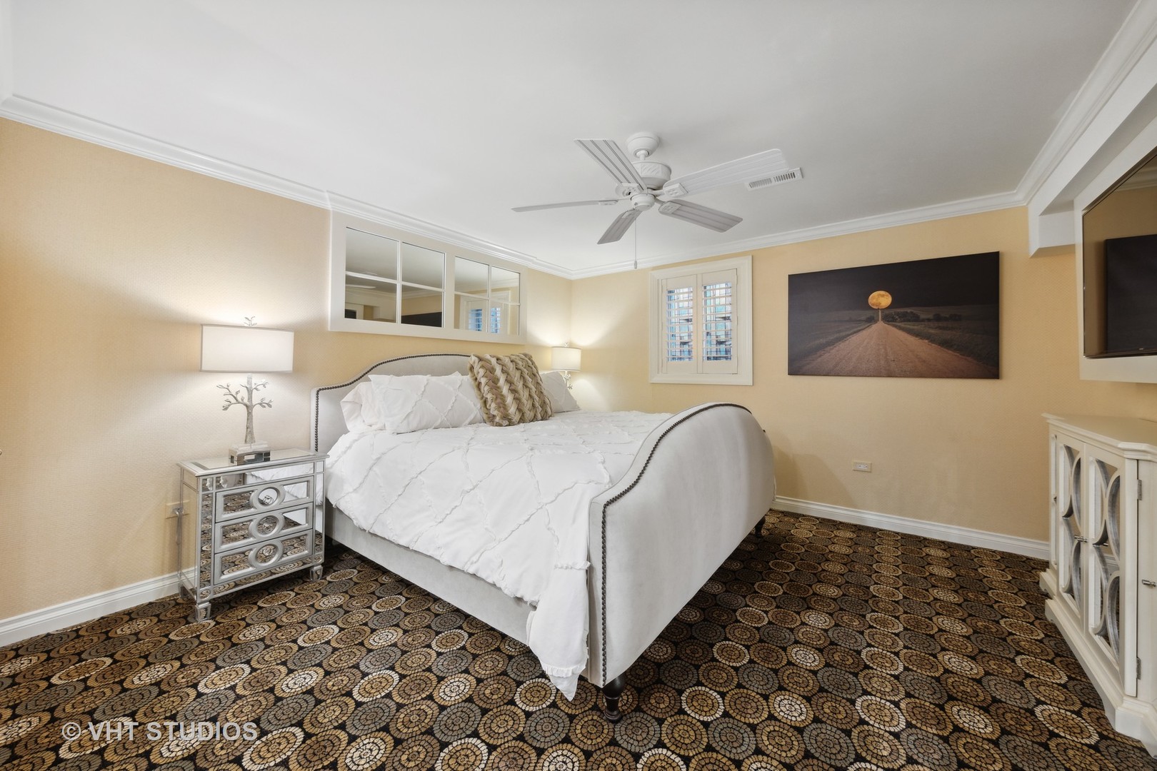 104 Burr Ridge Club Burr Ridge, IL 60527 - Photo 19 of 32 a bedroom with a bed and a flat screen tv