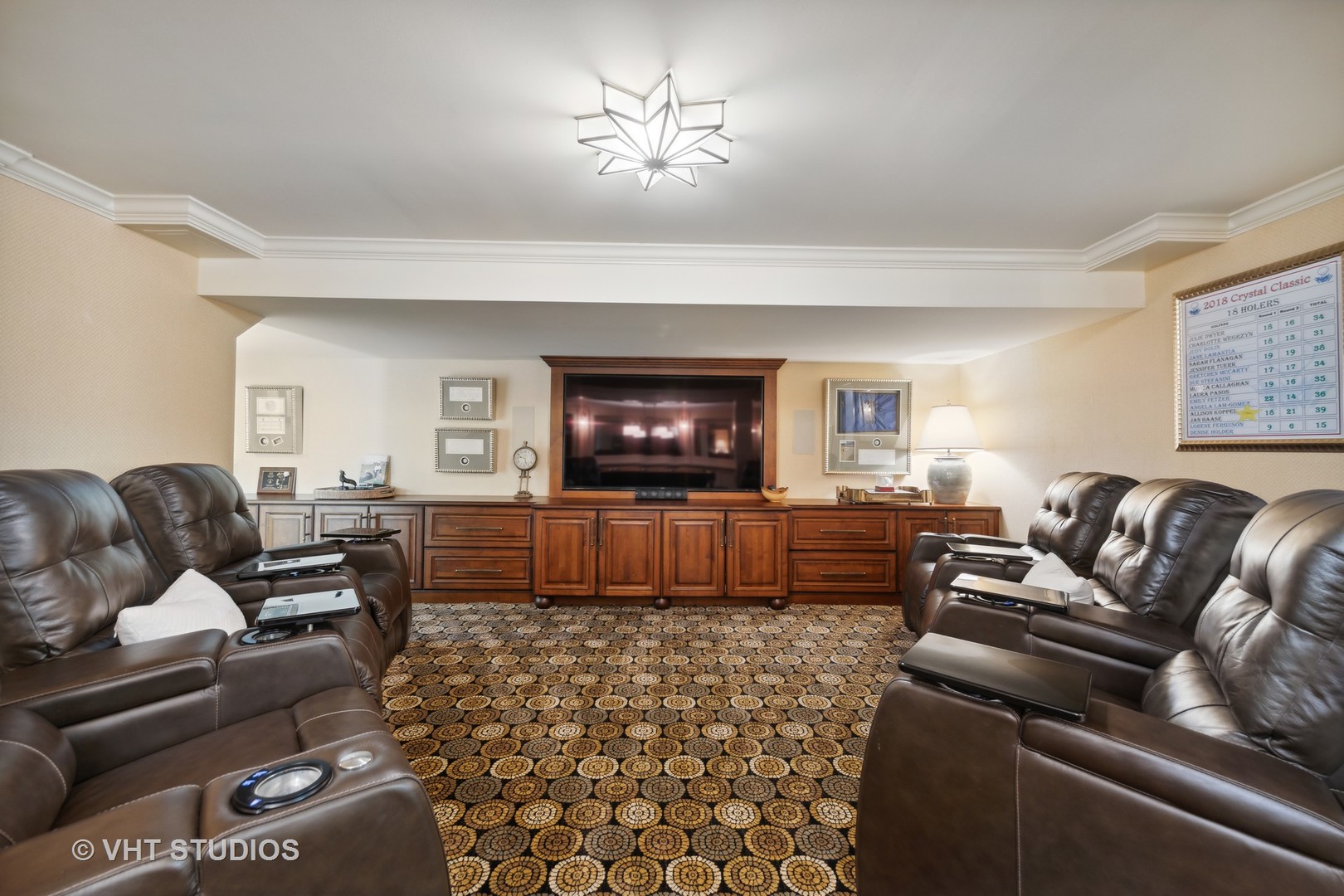 104 Burr Ridge Club Burr Ridge, IL 60527 - Photo 21 of 32 a living room with furniture and a flat screen tv