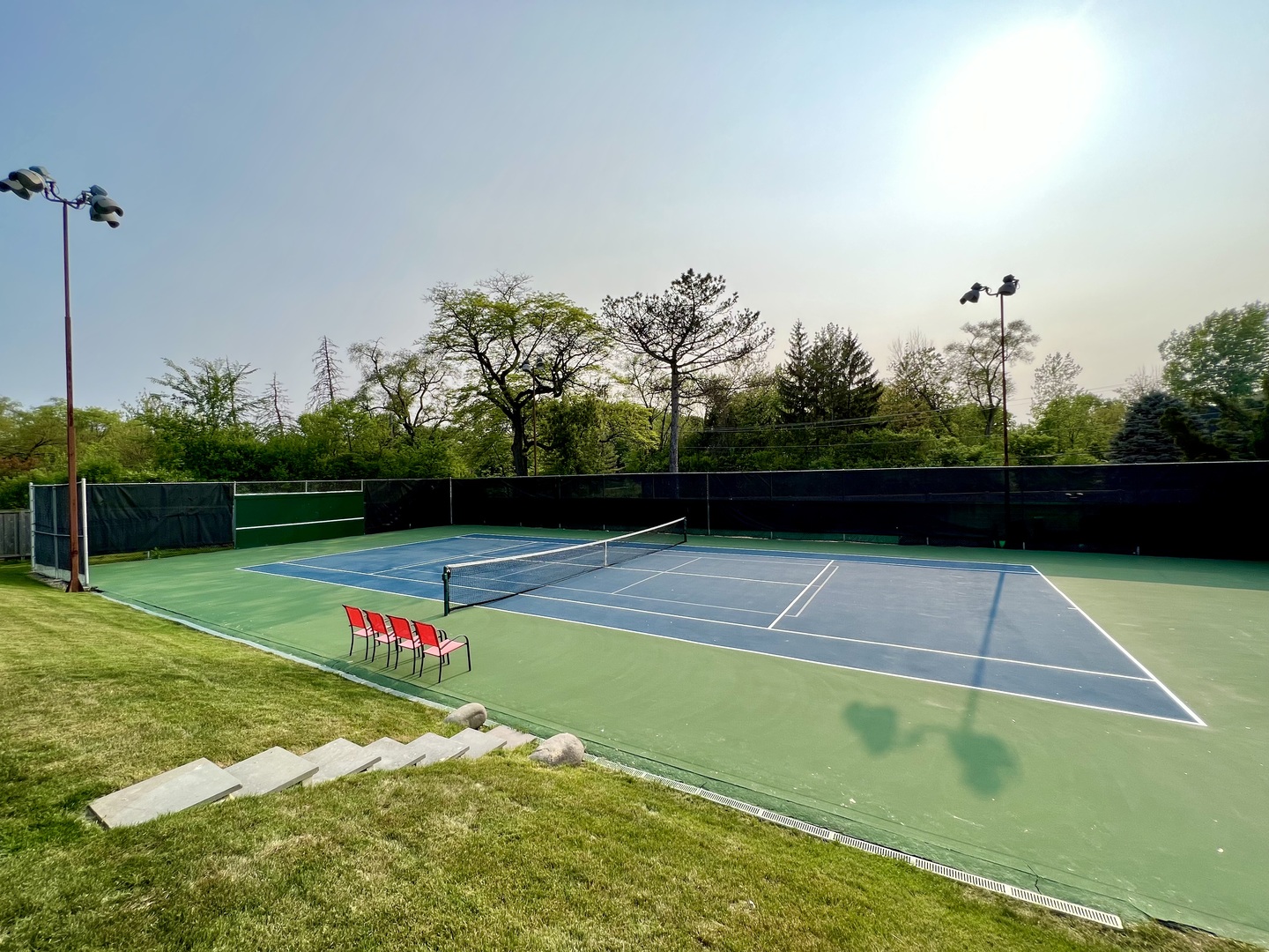 104 Burr Ridge Club Burr Ridge, IL 60527 - Photo 31 of 32 a view of an outdoor space and tennis court