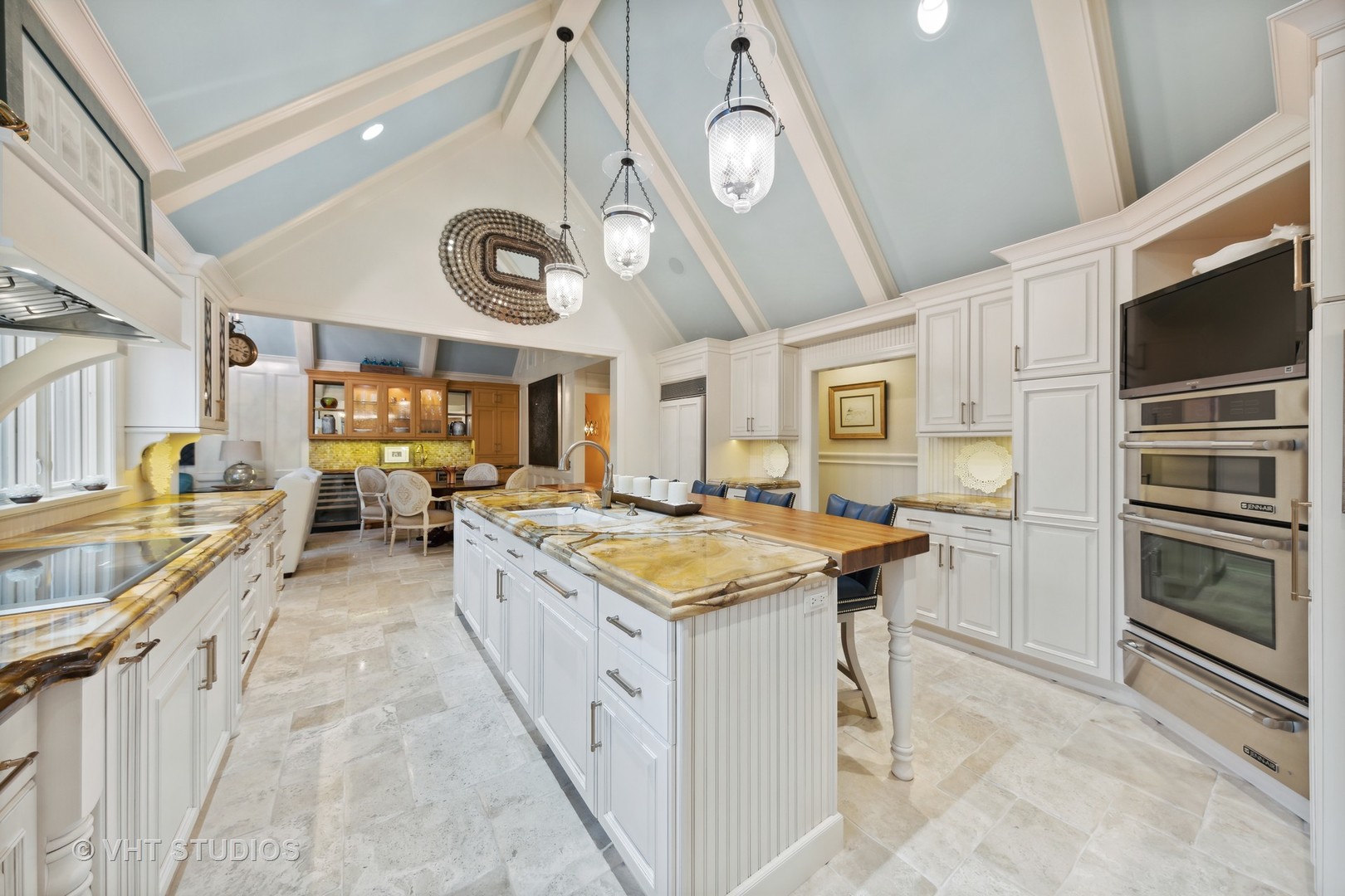 104 Burr Ridge Club Burr Ridge, IL 60527 - Photo 9 of 32 a kitchen with stainless steel appliances granite countertop a stove and cabinets