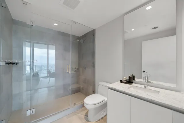 a view of a city with tall buildings