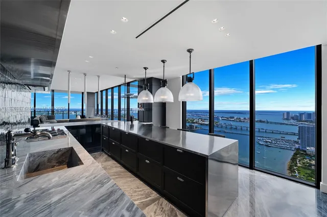 a bedroom with furniture and wooden floor