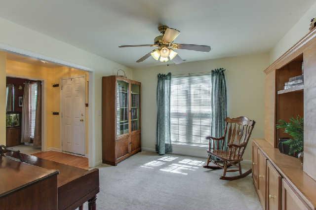 This room is actually the formal dining room  11x12 is big enough for a large table and hutch.  The dining room is right off the kitchen.