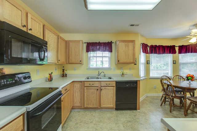 1620 Harrison Way Spring Hill, TN 37174 - Photo 9 of 18 Eat in kitchen with a bay window overlooking the fence backyard. Home has a security system.