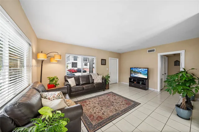 a living room with furniture and a couch