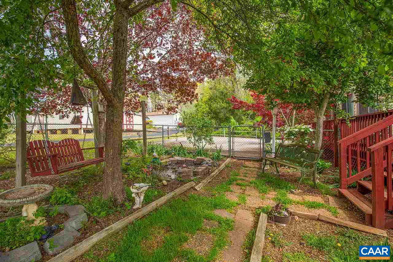 52 Morning Glory Road Ruckersville, VA 22968 - Photo 14 of 38 a view of a backyard with pathway