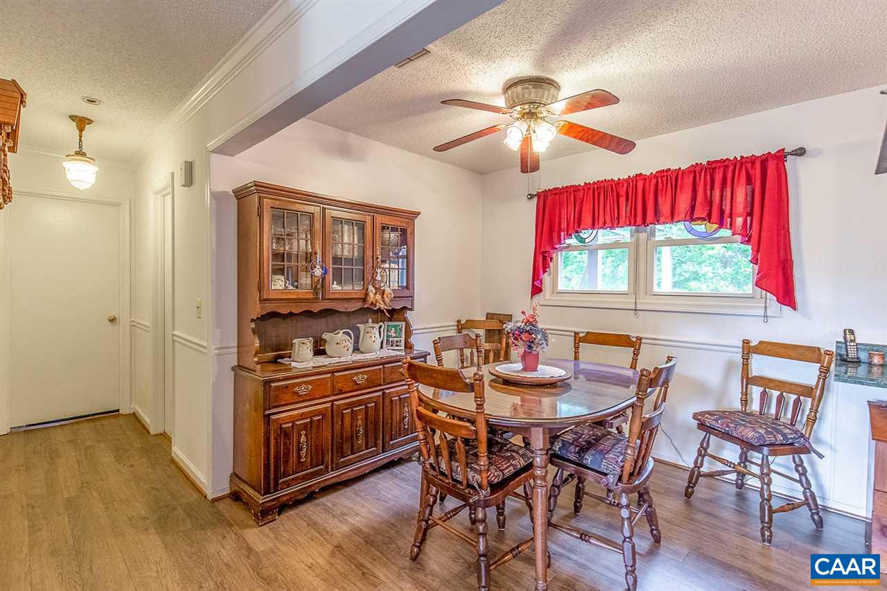 52 Morning Glory Road Ruckersville, VA 22968 - Photo 23 of 38 a kitchen with a table and chairs