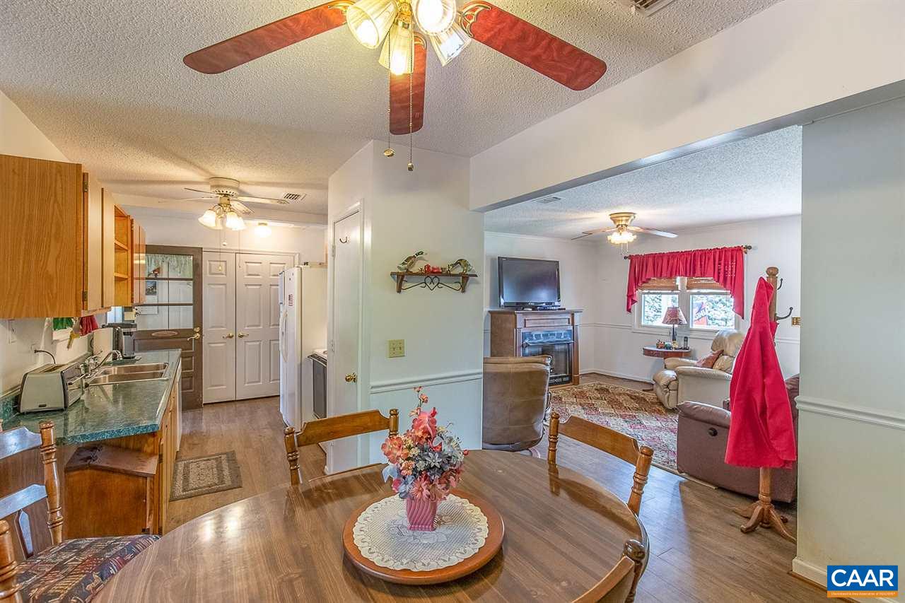 52 Morning Glory Road Ruckersville, VA 22968 - Photo 25 of 38 a living room with furniture and a wooden floor