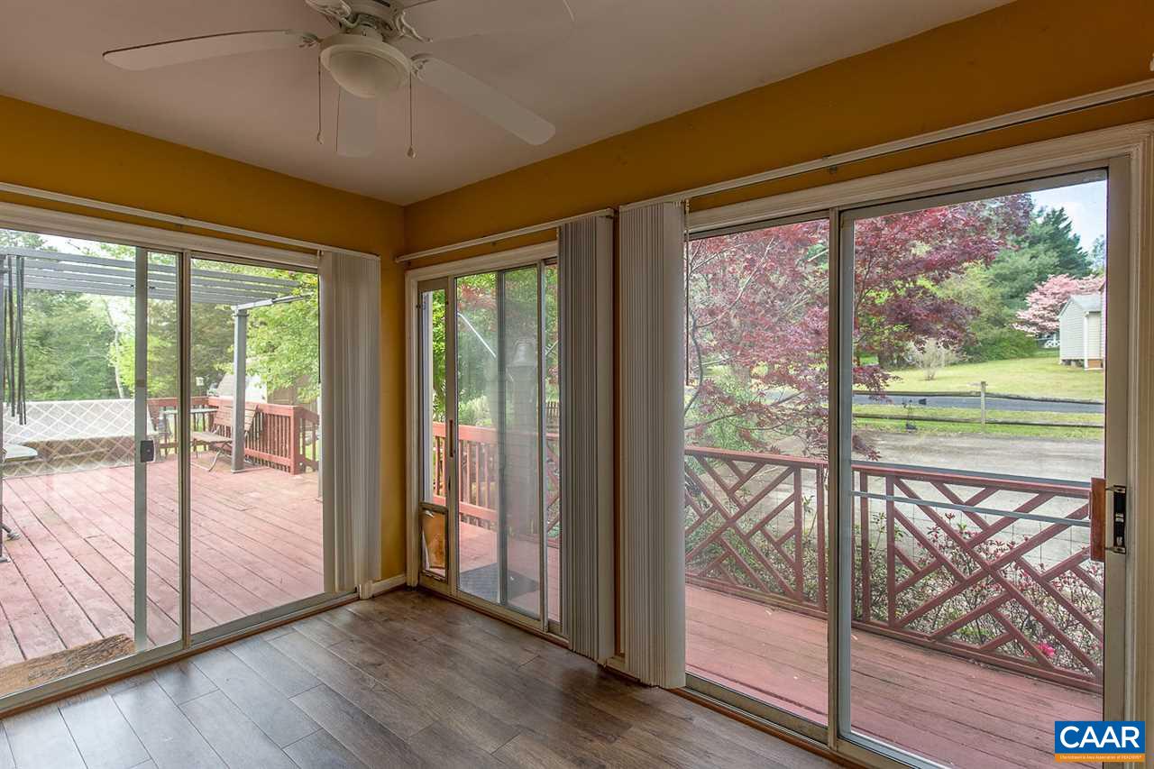 52 Morning Glory Road Ruckersville, VA 22968 - Photo 31 of 38 a view of an empty room with wooden floor and a window