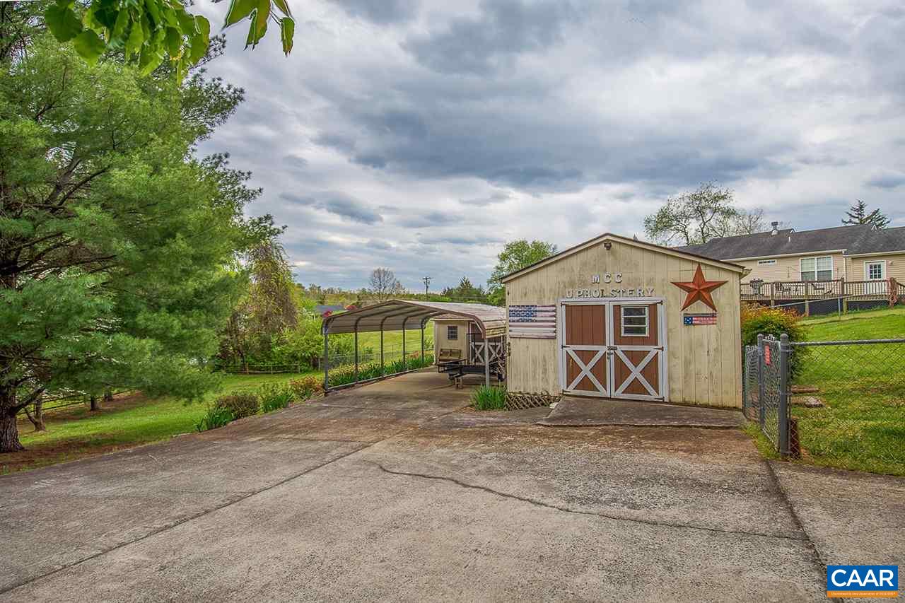 52 Morning Glory Road Ruckersville, VA 22968 - Photo 4 of 38 a view of a barn with wooden fence