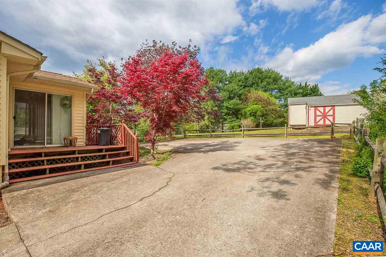 52 Morning Glory Road Ruckersville, VA 22968 - Photo 10 of 38 a front view of a house with a yard