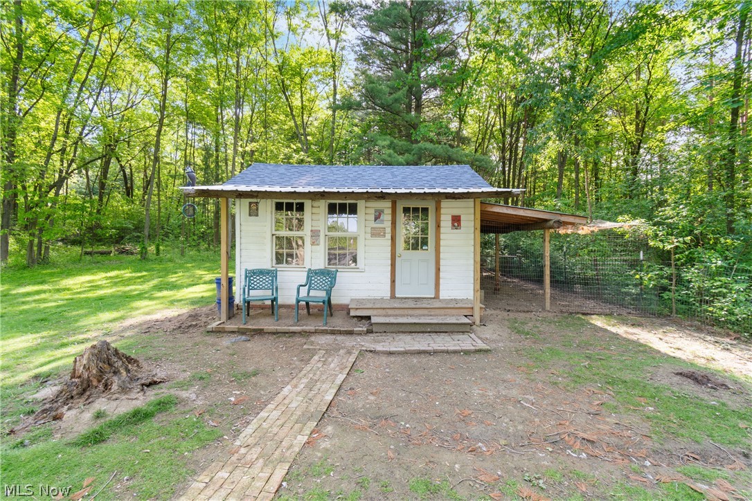 3255 Old Weymouth Road Medina, OH 44256 - Photo 29 of 31 View of shed / structure with a carport and a lawn