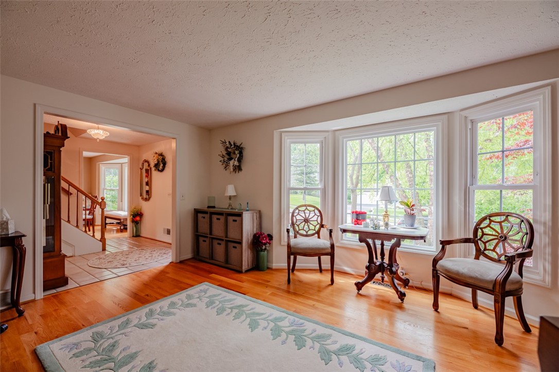 77 Misty Pine Road Perinton, NY 14450 - Photo 13 of 47 THESE PROFESSIONALLY INSTALLED HARDWOODS JUST SHIN