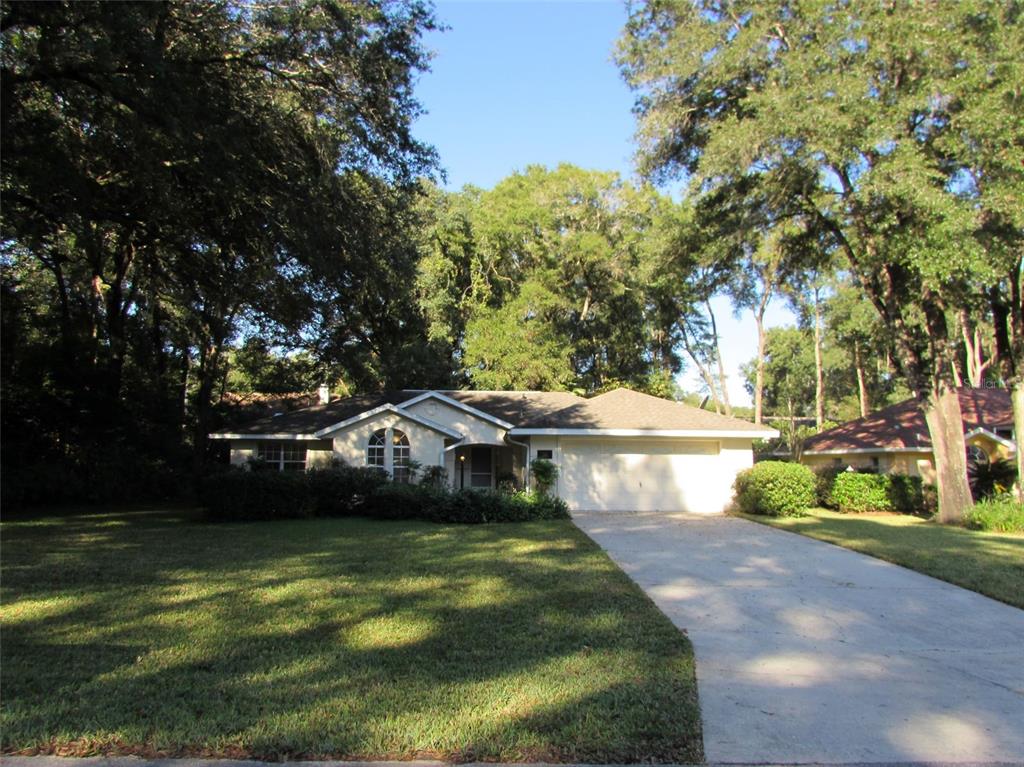 19205 Southwest 90th Ln Road Dunnellon, FL 34432 - Photo 1 of 1 a view of a lake with houses