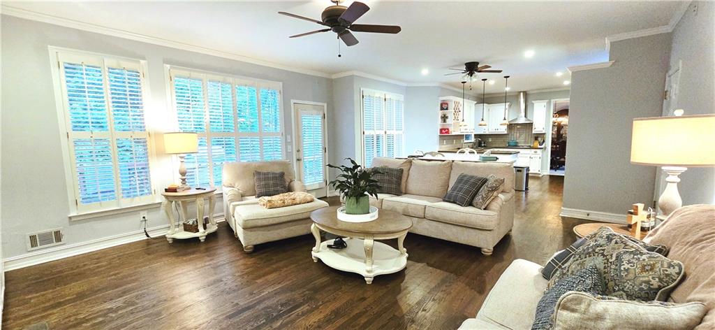 409 Misty Ridge Way Woodstock, GA 30189 - Photo 3 of 20 a living room with furniture and a large window