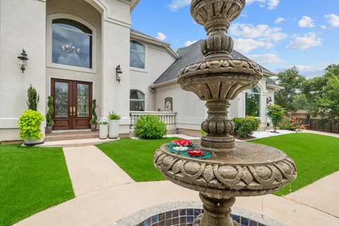 an aerial view of a house with a garden