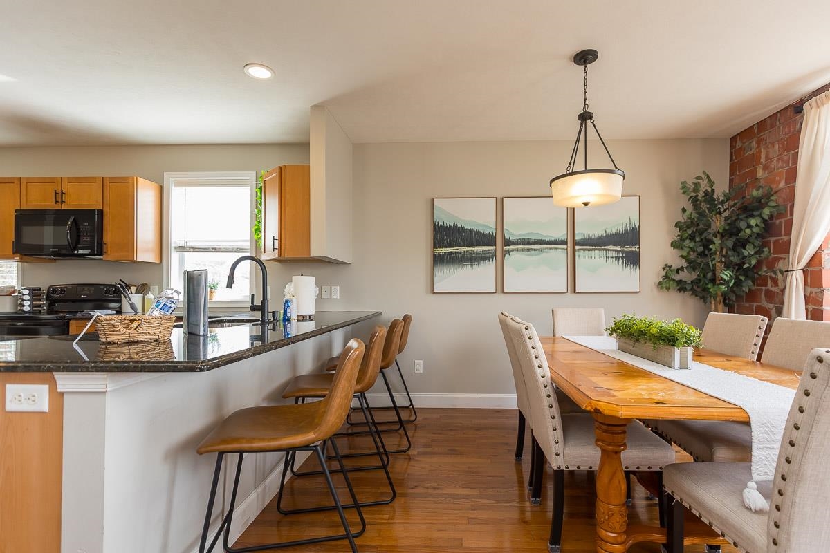 442 First Street Shenandoah, VA 22849 - Photo 12 of 75 a view of a dining room with furniture window and wooden floor