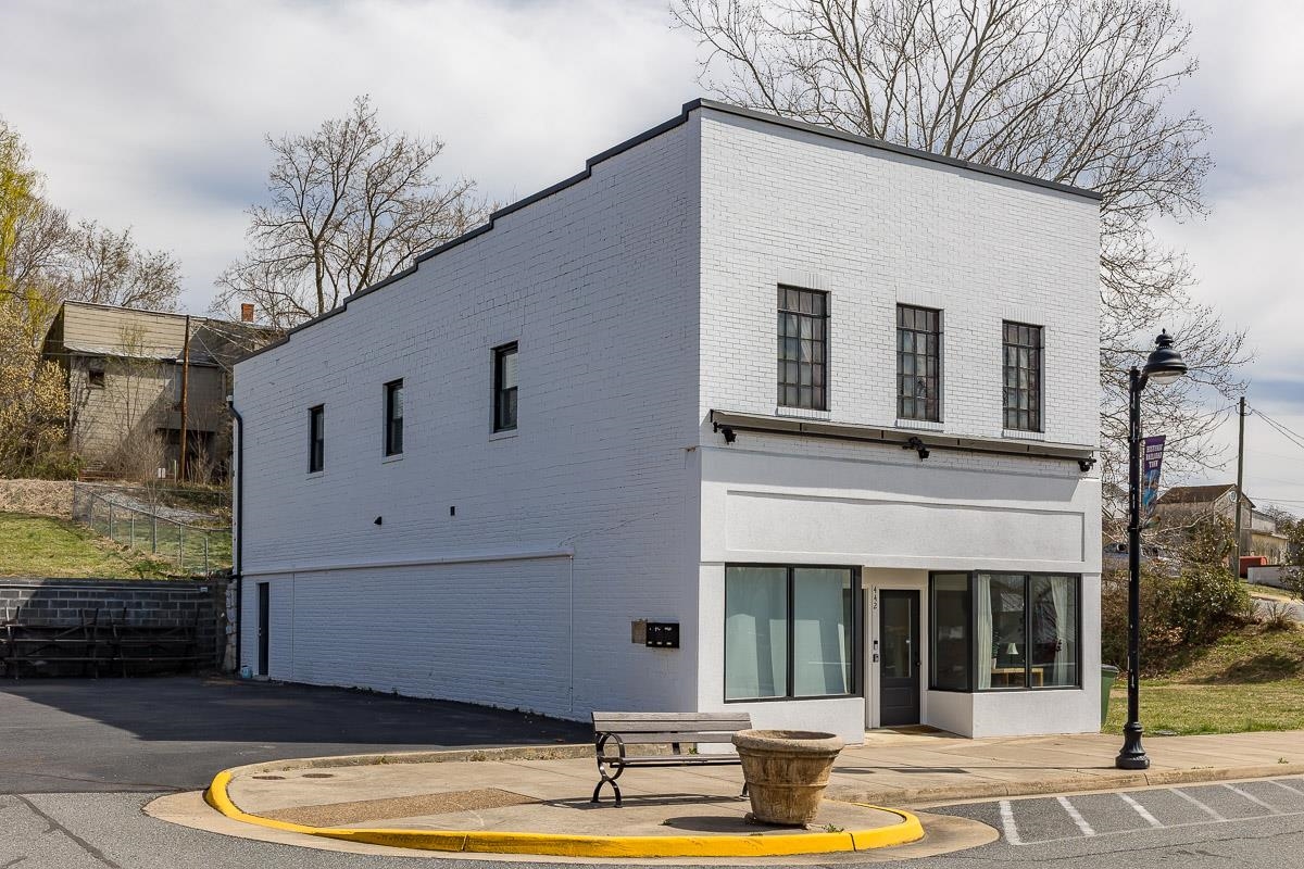 442 First Street Shenandoah, VA 22849 - Photo 2 of 75 a view of a white house with a swimming pool