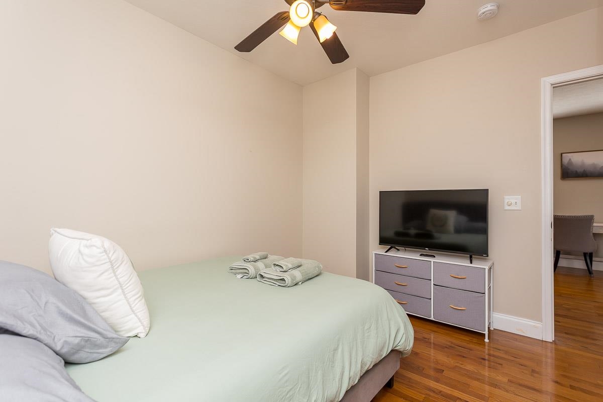 442 First Street Shenandoah, VA 22849 - Photo 31 of 75 a bedroom with a bed and a flat screen tv