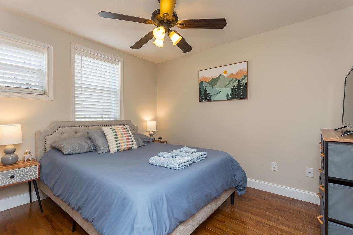 442 First Street Shenandoah, VA 22849 - Photo 32 of 75 a bedroom with a bed and wooden floor