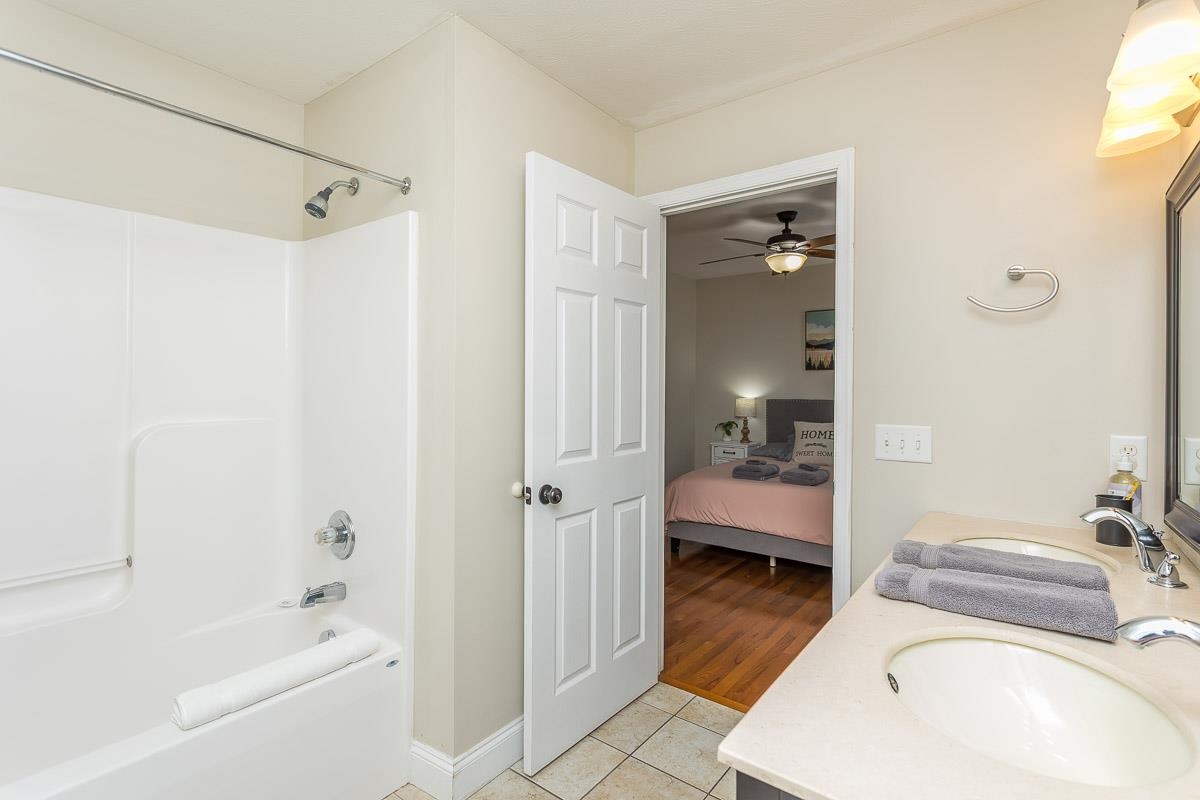 442 First Street Shenandoah, VA 22849 - Photo 42 of 75 a bathroom with a sink a toilet and shower