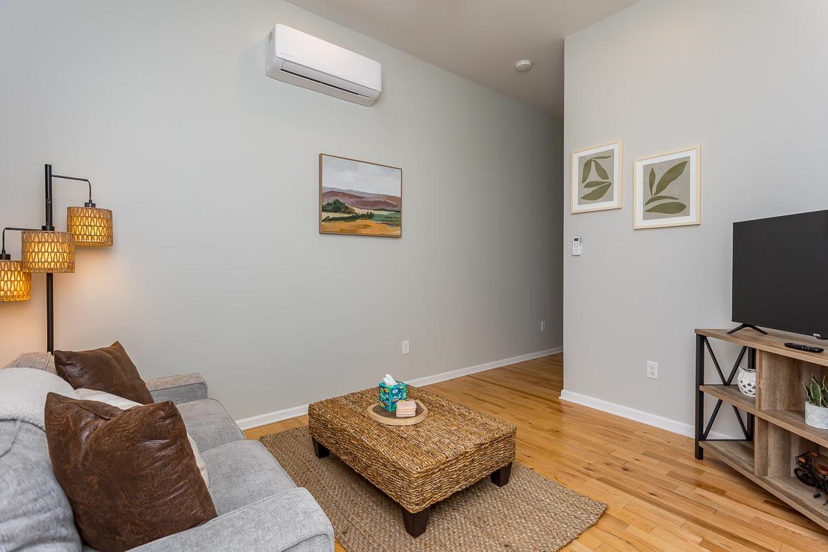 442 First Street Shenandoah, VA 22849 - Photo 44 of 75 a living room with furniture and a flat screen tv