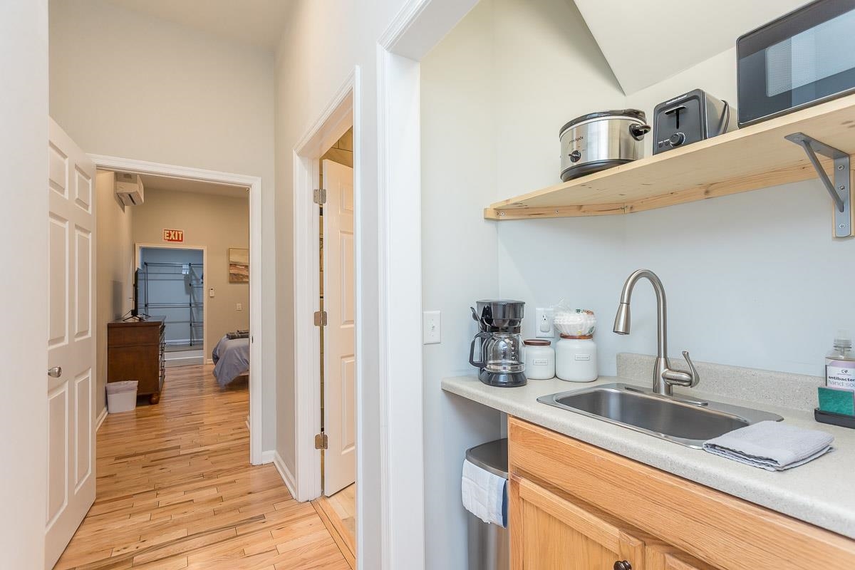 442 First Street Shenandoah, VA 22849 - Photo 46 of 75 a kitchen with stainless steel appliances granite countertop a sink and a refrigerator
