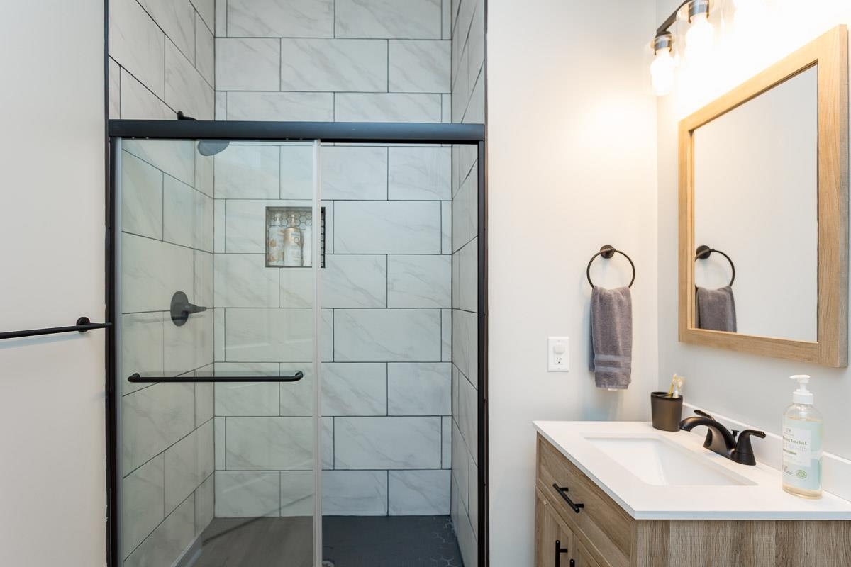442 First Street Shenandoah, VA 22849 - Photo 52 of 75 a bathroom with a sink and a mirror