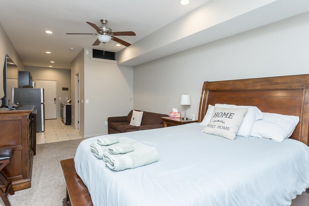 442 First Street Shenandoah, VA 22849 - Photo 63 of 75 a bedroom with a bed and ceiling fan