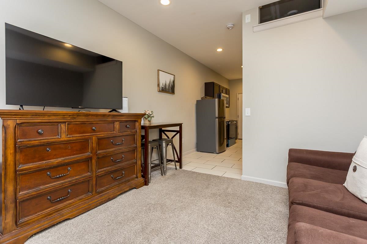 442 First Street Shenandoah, VA 22849 - Photo 65 of 75 a view of room with furniture and a flat screen tv