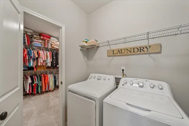 a spacious bathroom with a granite countertop sink mirror and a bath tub