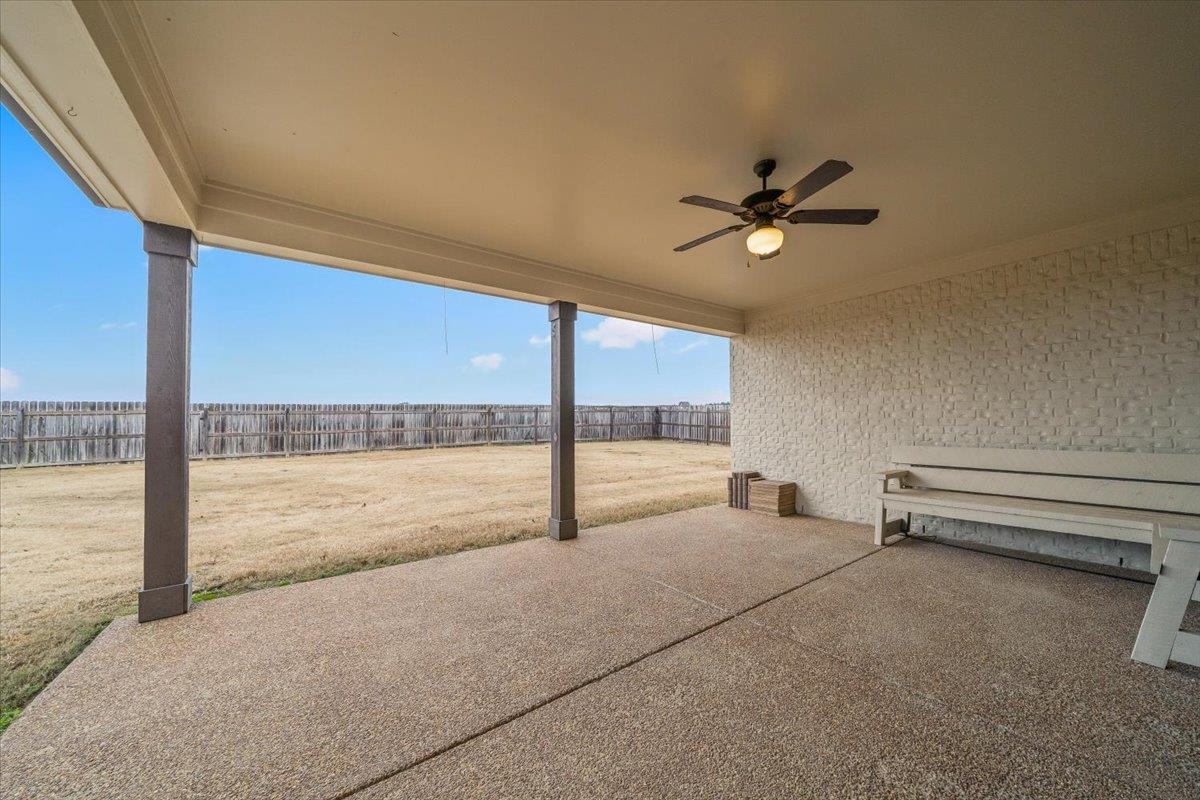 55 Cypress Point Road Oakland, TN 38060 - Photo 25 of 32 a view of a living room and floor to ceiling window