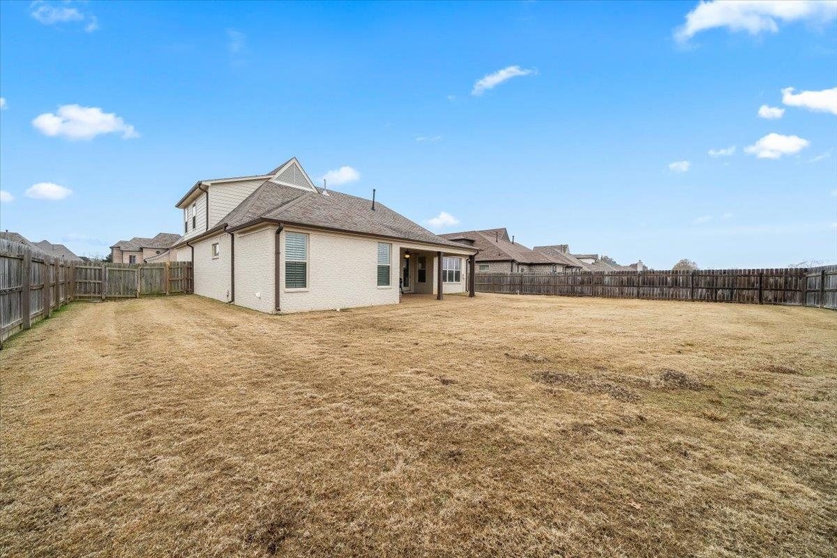 55 Cypress Point Road Oakland, TN 38060 - Photo 28 of 32 a house with river in front of it