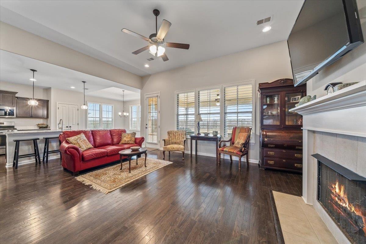 55 Cypress Point Road Oakland, TN 38060 - Photo 5 of 32 a living room with furniture and wooden floor