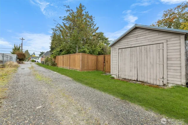 a view of a backyard of the house