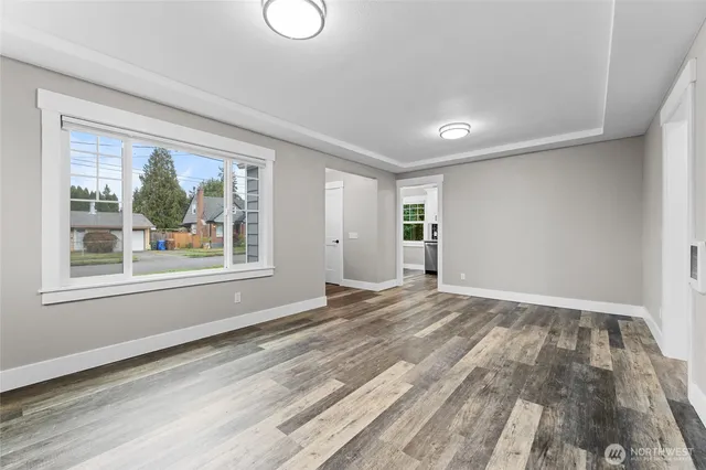 a view of an empty room with a window