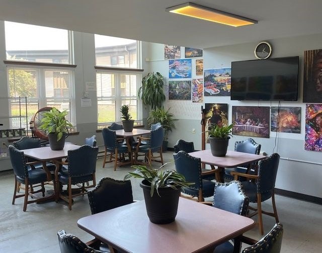 1919 North 11th Street Milwaukee, WI 53205 - Photo 7 of 11 a view of a dining room with furniture and wooden floor