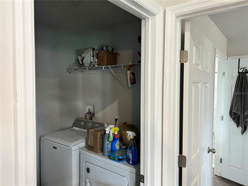 4264 East Taper Street Inverness, FL 34453 - Photo 16 of 29 a view of storage and utility room with washing machine