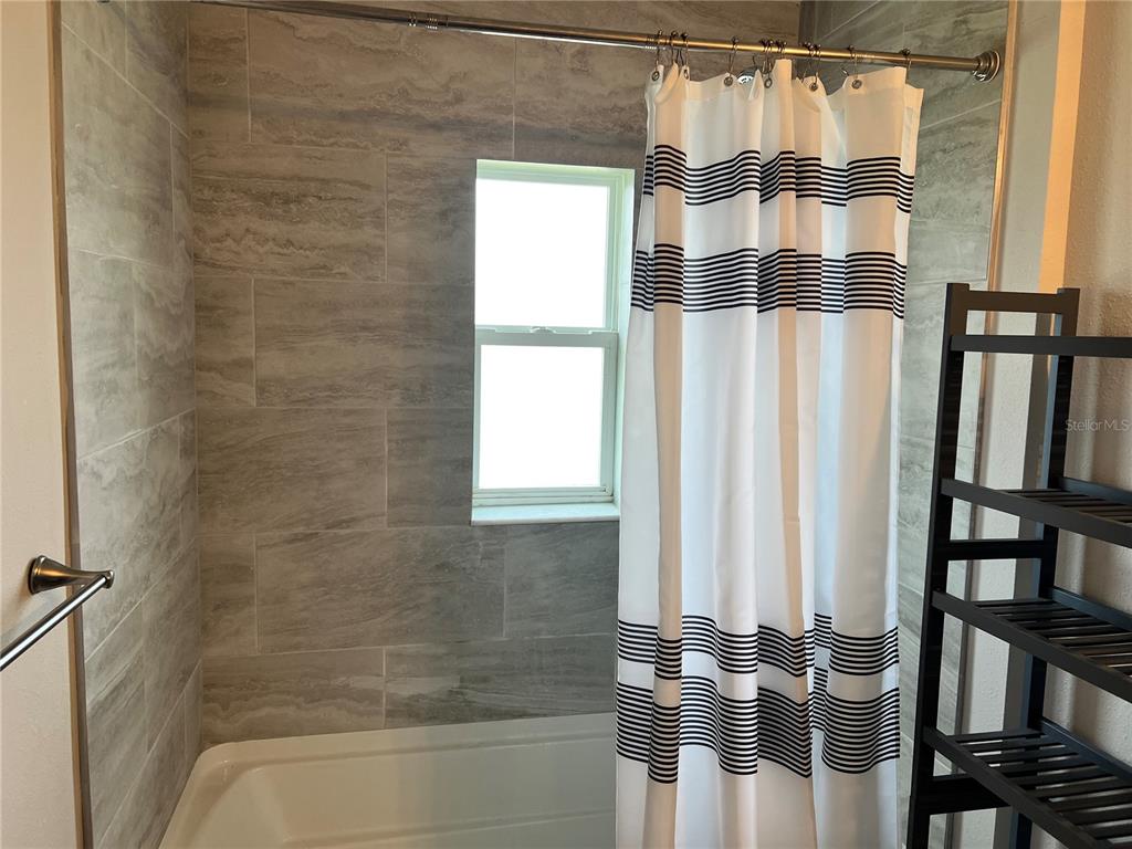 4264 East Taper Street Inverness, FL 34453 - Photo 29 of 29 a bathroom with a bathtub and shower