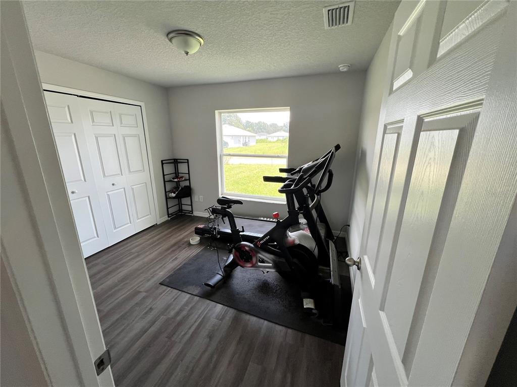 4264 East Taper Street Inverness, FL 34453 - Photo 10 of 29 a view of a room with gym equipment
