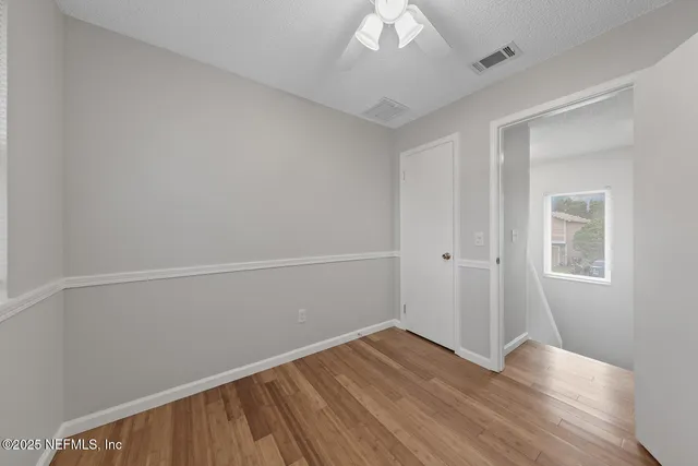 a view of backyard with green space