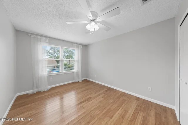 front view of a house with a garden