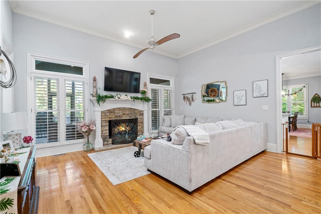 11 York Trace Southeast Cartersville, GA 30121 - Photo 12 of 71 a living room with furniture a flat screen tv and a fireplace