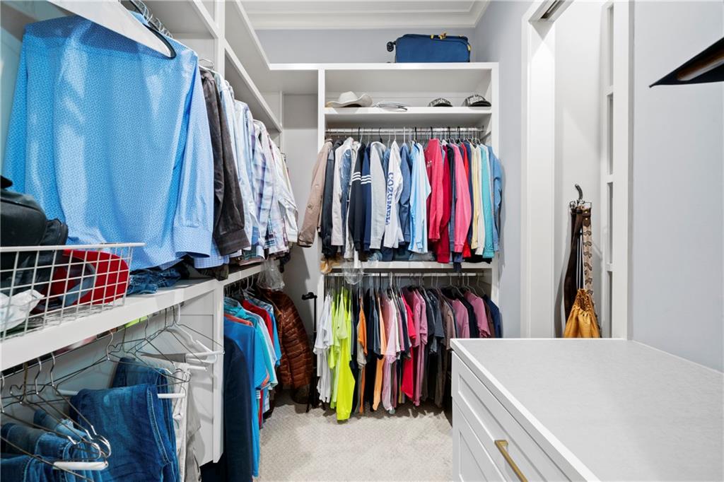 11 York Trace Southeast Cartersville, GA 30121 - Photo 37 of 71 a view of walk in closet with clothes